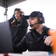 KellyMoss Co-Owner Victoria Thomas, left, watching the three women driver finalists on track.
